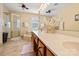 Bathroom featuring double sinks, an alcove tub, and a glass shower stall with good lighting at 1666 Sam Smith Rd, Fort Mill, SC 29708