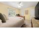 Relaxing bedroom featuring a ceiling fan, carpet, and neutral walls at 1666 Sam Smith Rd, Fort Mill, SC 29708