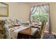 Well-appointed dining room with elegant chairs, a dark wood table, and an eye-catching window treatment at 1666 Sam Smith Rd, Fort Mill, SC 29708