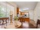 Cozy kitchen featuring a round table, stainless steel appliances, and a breakfast bar with granite countertops at 1666 Sam Smith Rd, Fort Mill, SC 29708