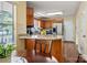 Kitchen featuring wood cabinets, granite countertops, stainless steel appliances and hardwood floors at 1666 Sam Smith Rd, Fort Mill, SC 29708