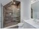 Bathroom featuring an enclosed tiled shower and white vanity at 1919 Shoreham Dr, Charlotte, NC 28211