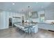 Bright kitchen with a large island, high-end appliances, and modern lighting fixtures at 1919 Shoreham Dr, Charlotte, NC 28211