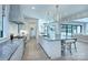 Bright kitchen features a large island, modern appliances and fixtures, and an open floor plan to the backyard at 1919 Shoreham Dr, Charlotte, NC 28211