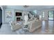 Beautifully furnished living room with fireplace, modern decor, and hardwood floors at 1919 Shoreham Dr, Charlotte, NC 28211