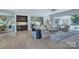 Spacious living room with open layout, bar, and view of the modern kitchen at 1919 Shoreham Dr, Charlotte, NC 28211