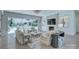 Bright living room featuring a fireplace, hardwood floors and sliding doors to the patio at 1919 Shoreham Dr, Charlotte, NC 28211