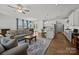 Open-concept living space with a modern kitchen, a cozy living room, and dining area at 2034 Suttonview Rd, Fort Mill, SC 29708