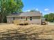 The home features a backyard with a wooden deck and newly laid straw at 2362 Marett Blvd, Rock Hill, SC 29732