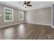 Inviting bedroom features wood-look flooring, neutral paint, and ample natural light at 2362 Marett Blvd, Rock Hill, SC 29732