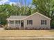 Cozy single-story home featuring a classic front porch, complemented by a newly seeded lawn at 2362 Marett Blvd, Rock Hill, SC 29732