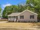 Charming single-story home with a welcoming front porch and freshly mulched lawn at 2362 Marett Blvd, Rock Hill, SC 29732