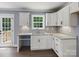 Kitchen with access to the backyard and features granite countertops at 2362 Marett Blvd, Rock Hill, SC 29732