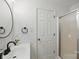 Bright bathroom with a modern vanity, a glass-enclosed shower, and contemporary fixtures at 2530 Cochrane Dr, Charlotte, NC 28269
