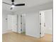 Spacious bedroom features multiple closets and an en-suite bathroom with a tub at 2530 Cochrane Dr, Charlotte, NC 28269