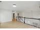 Bright loft space features modern lighting, hardwood floors, and an open railing at 2530 Cochrane Dr, Charlotte, NC 28269