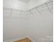 Efficient walk-in closet with wire shelving for organized storage at 2530 Cochrane Dr, Charlotte, NC 28269