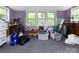 Room filled with items featuring windows for natural light and potential storage space at 3012 Morgan Mill Rd, Monroe, NC 28110
