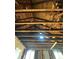 View of the rafters during renovation, showing exposed beams at 334 Whitner St, Rock Hill, SC 29730