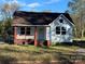 Exterior view of a home under construction with white siding and dark roof at 334 Whitner St, Rock Hill, SC 29730