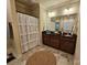 Bathroom with a double sink, dark wood vanity, and neutral wall paint at 4203 Flint Dr, Lancaster, SC 29720