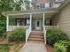 Inviting front porch with white railings and brick steps leading to the front door at 4203 Flint Dr, Lancaster, SC 29720