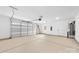 Spacious two-car garage with an insulated door, epoxy floors, and a water heater at 5125 Carden Dr, Charlotte, NC 28227