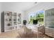 Bright office space with built-in shelves, a modern desk, and a large window view at 5125 Carden Dr, Charlotte, NC 28227