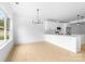 Bright, open floorplan featuring the kitchen, dining, and living spaces, perfect for entertaining at 5125 Carden Dr, Charlotte, NC 28227