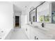 Spacious bathroom features double vanity, black accents, tile, and a walk-in closet at 5209 Carden Dr, Charlotte, NC 28227