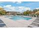 Stunning community pool with ample seating, umbrellas, and a clubhouse for luxurious relaxation at 5247 Looking Glass Trl, Denver, NC 28037