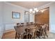 Dining room featuring a traditional chandelier and neutral wall paint at 6001 Pine Cone Ln, Monroe, NC 28110