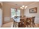 Spacious dining room with wood flooring and natural light at 6001 Pine Cone Ln, Monroe, NC 28110