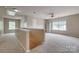 Bright and airy loft space with ample natural light, perfect for a playroom, home office, or additional living area at 6001 Pine Cone Ln, Monroe, NC 28110