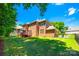 Expansive backyard with mature trees, well-maintained lawn, screened-in back porch, wooden deck, and basketball court at 618 Chase Ct, Fort Mill, SC 29708