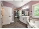 Elegant bathroom featuring a soaking tub, glass-enclosed shower, and refined fixtures at 618 Chase Ct, Fort Mill, SC 29708