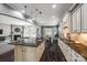 Open kitchen with granite island, leading to a dining area and living space at 618 Chase Ct, Fort Mill, SC 29708