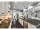 Gourmet kitchen with a large island, stainless steel appliances and dark wood floors at 618 Chase Ct, Fort Mill, SC 29708