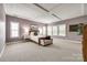 Spacious primary bedroom with tray ceiling, and large windows that provide lots of natural light at 618 Chase Ct, Fort Mill, SC 29708