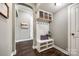 Mudroom features a bench with coat hooks and storage cubbies at 618 Chase Ct, Fort Mill, SC 29708
