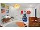 Charming Bedroom with a wooden crib, stylish decor, and ample storage at 6508 Trenton Pl, Charlotte, NC 28226