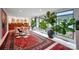 Bright dining area with a large window, stylish chairs, hardwood floors, and abundant natural light at 6508 Trenton Pl, Charlotte, NC 28226