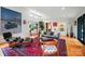 Spacious living room with hardwood floors, comfortable seating, elegant decor, and ample natural light at 6508 Trenton Pl, Charlotte, NC 28226
