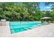 Stunning backyard with modern pool and lush landscaping at 6508 Trenton Pl, Charlotte, NC 28226