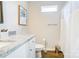 Modern bathroom featuring white cabinetry, granite countertops, and modern fixtures at 809 Fisher St, Kannapolis, NC 28027