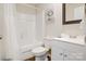 Bathroom with white vanity, mirror, shower and tub combination at 809 Fisher St, Kannapolis, NC 28027