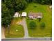 Aerial view of the property, showing its nice lot and outbuildings at 8140 Karriker Rd, Kannapolis, NC 28081