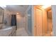 Bathroom featuring granite countertops, tile floors and shower with blue accents at 8140 Karriker Rd, Kannapolis, NC 28081