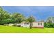 Charming single-story home with a welcoming porch and well-maintained lawn at 8140 Karriker Rd, Kannapolis, NC 28081