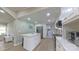 Bright kitchen featuring white cabinets, stainless steel appliances, and an island with seating at 8140 Karriker Rd, Kannapolis, NC 28081